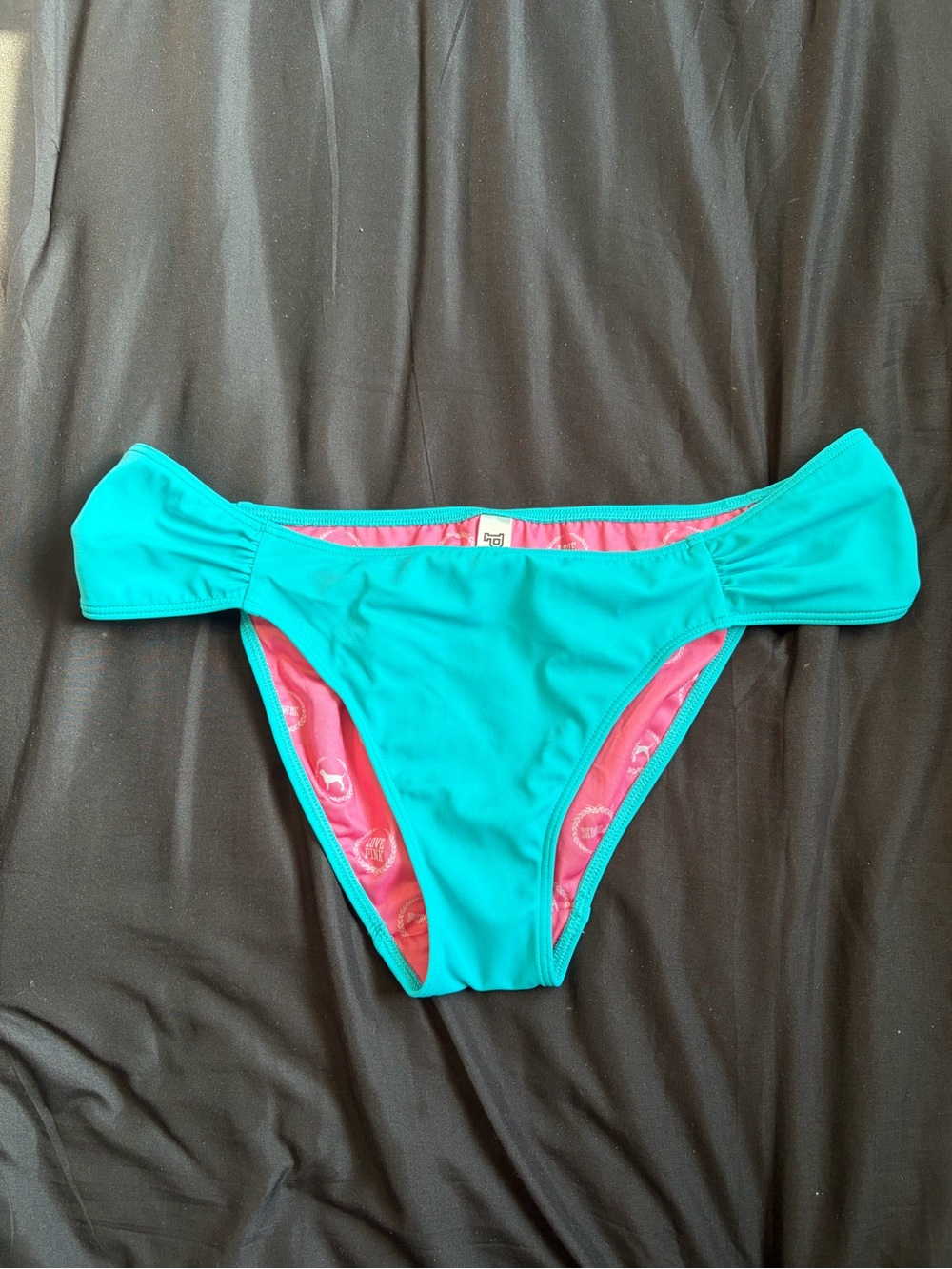 Victoria's Secret PINK teal bikini bottoms w/pink LOVE PINK&dog inside. Size M.